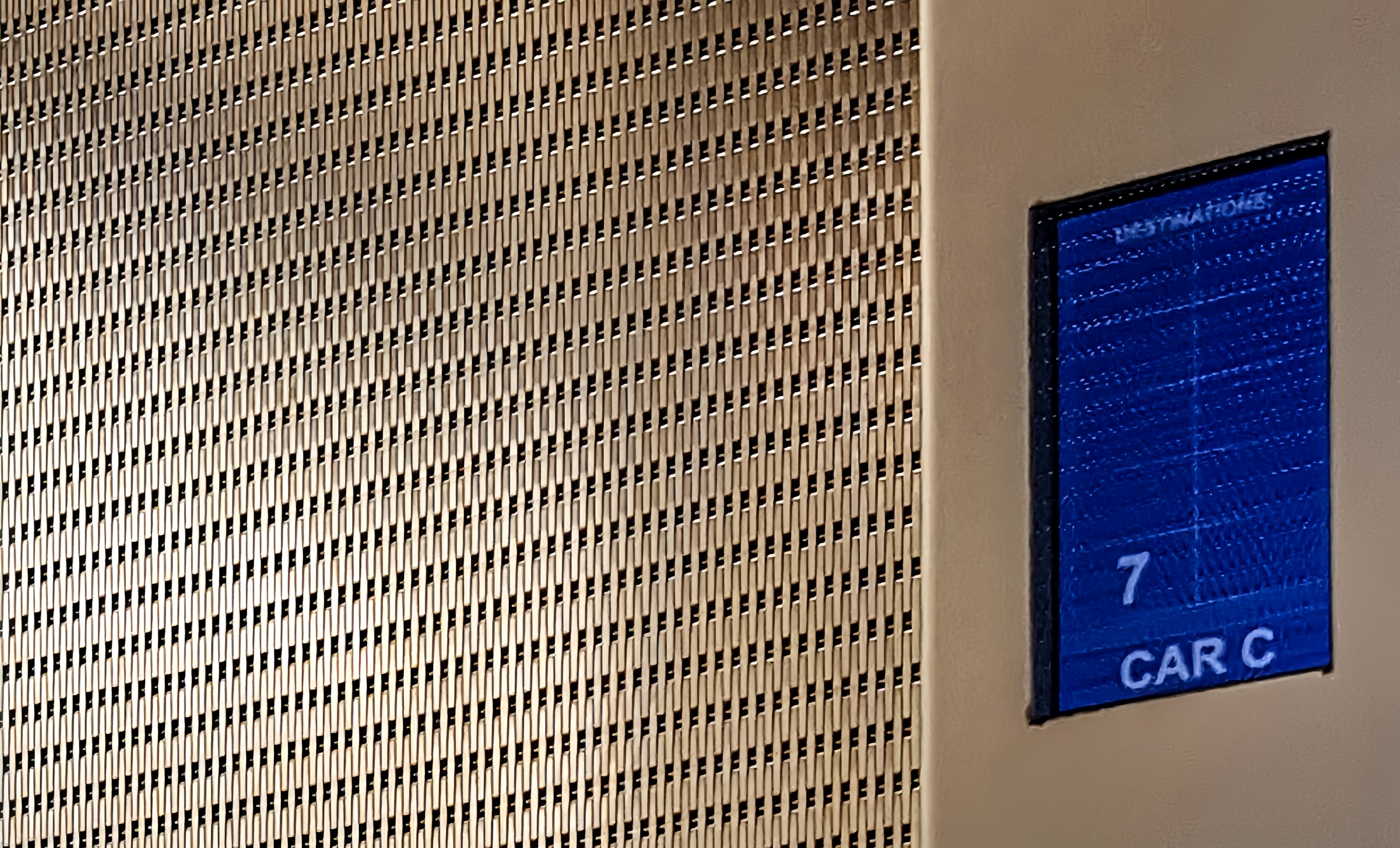 Metal mesh elevator cab interior